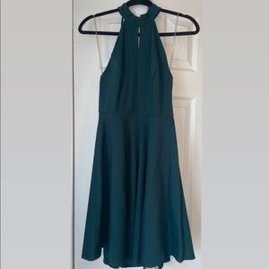 Emerald green dress, pretty back & flowy